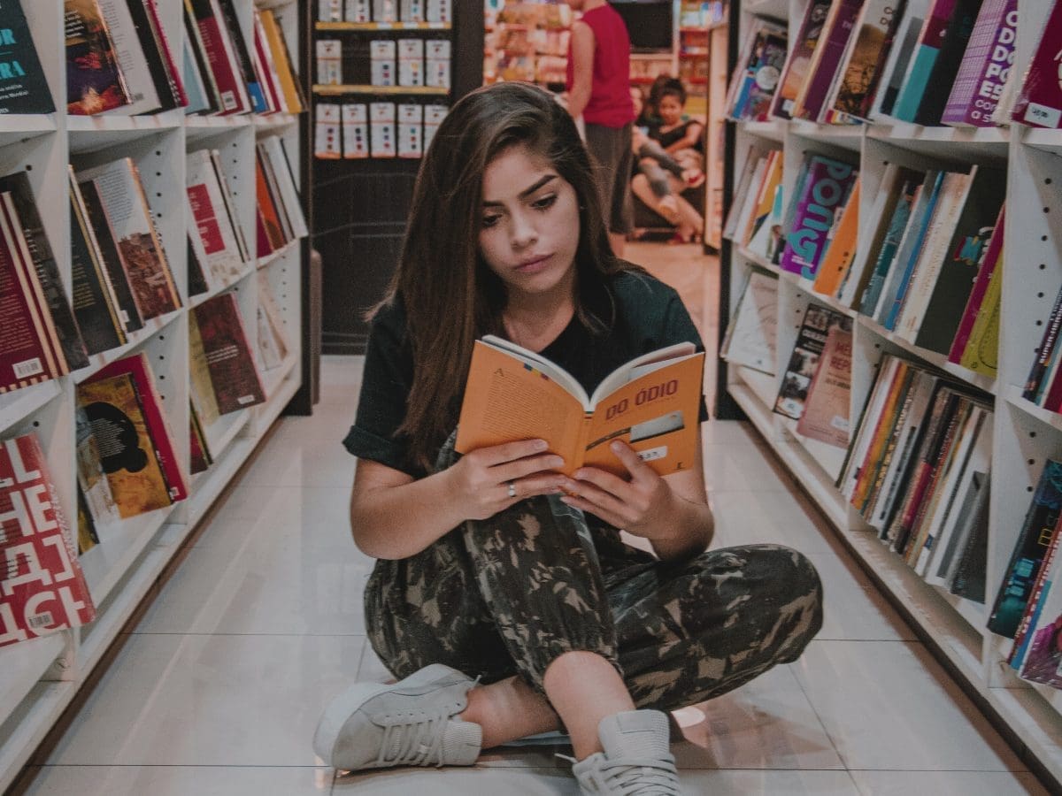 girl reading in library